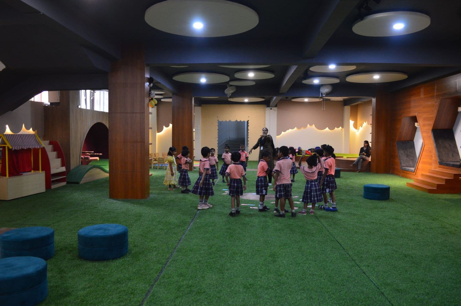 Children walking around the library hall together