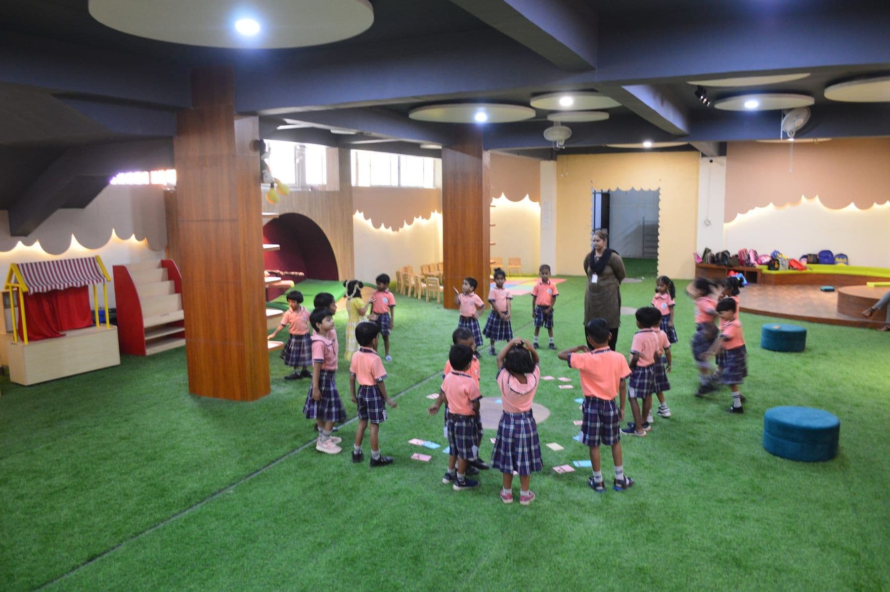 Children gathered in a circle for a group game