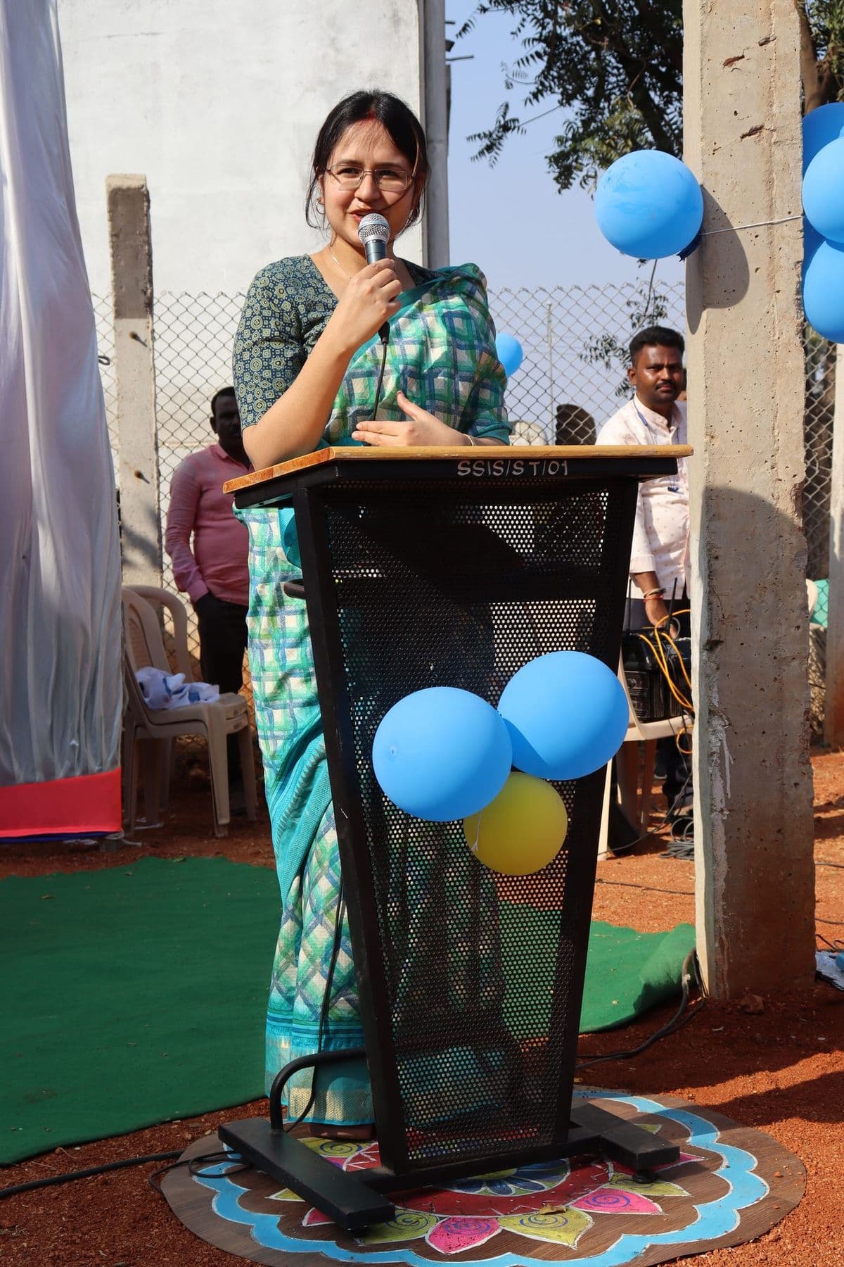 A speaker at the podium during the Little Champs sports meet