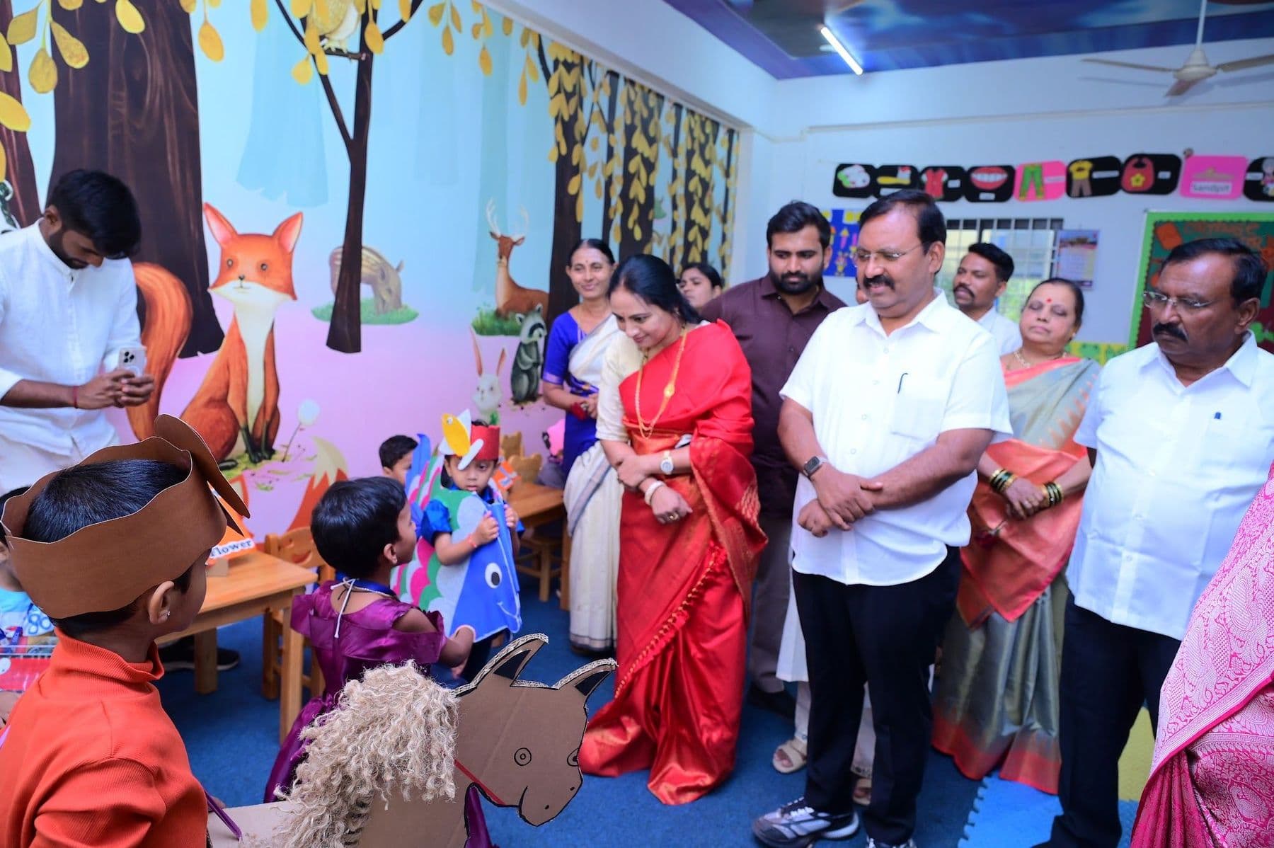 A child in costume performing for guests at Avishkar