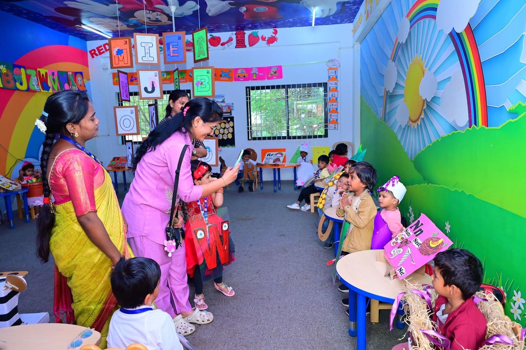 Guests walking through a classroom of exhibits
