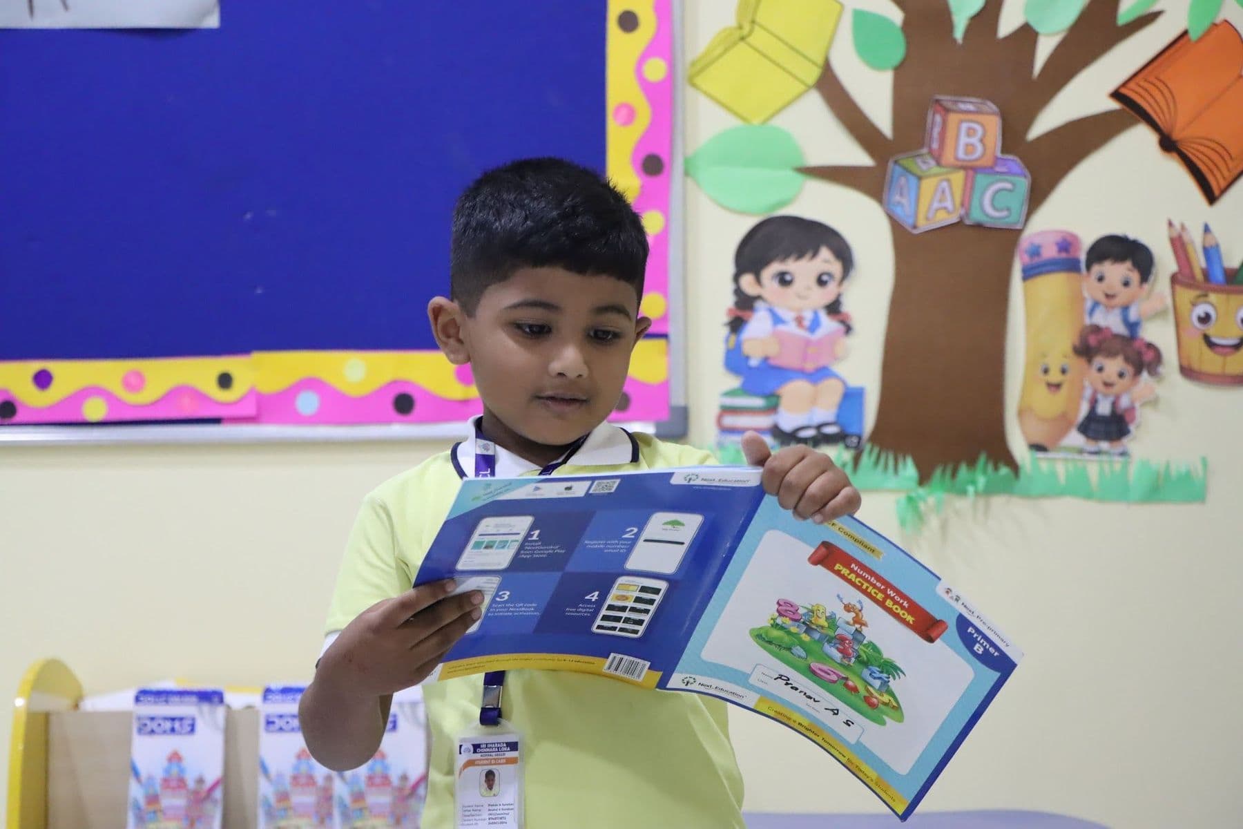 A boy reading a picture book