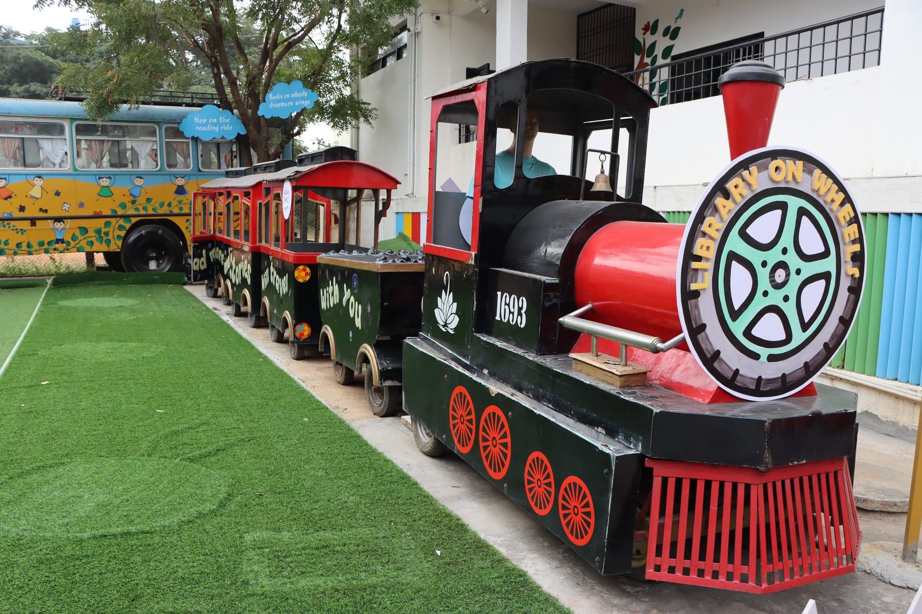 The black and red Library on Wheels toy train engine